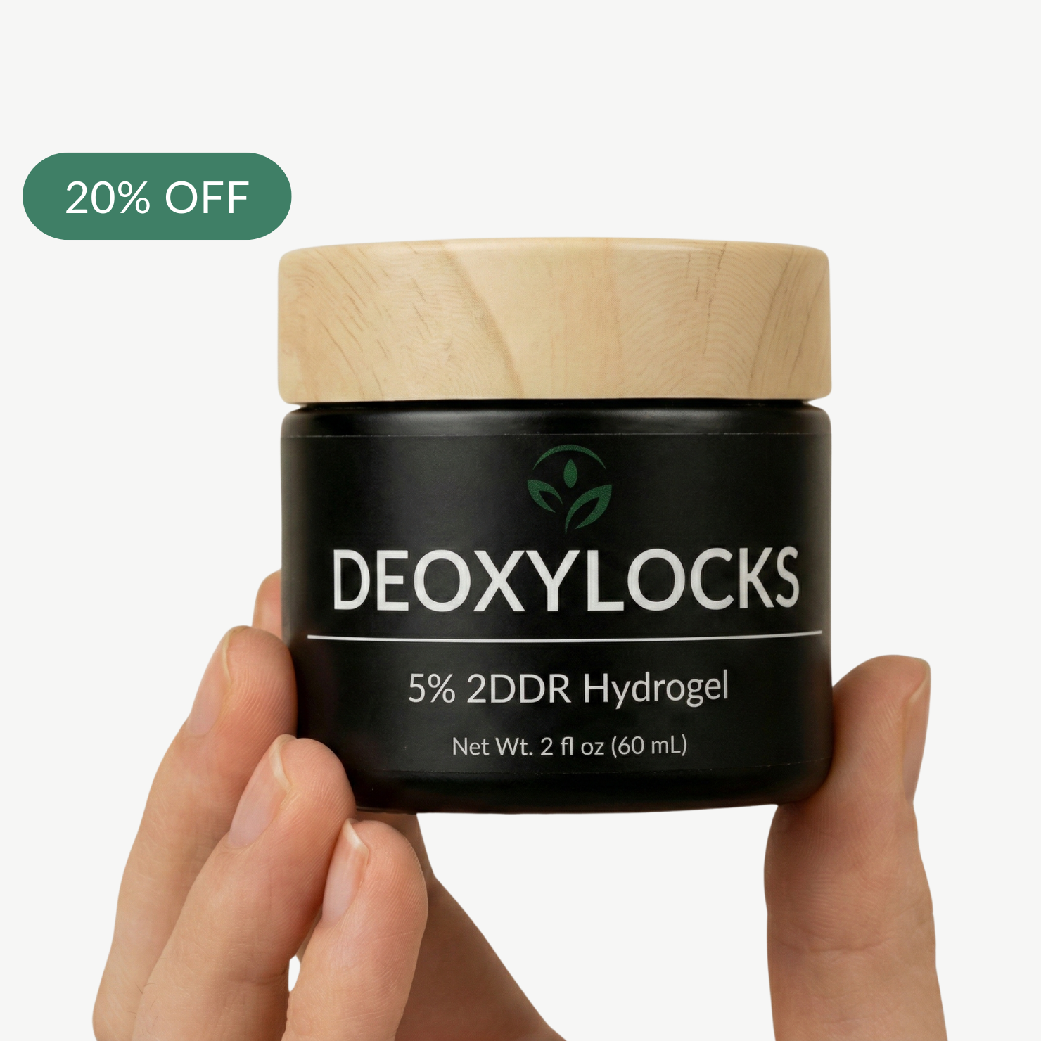 Deoxylocks 5% 2DDR Hydrogel jar held by a hand with a 20% off label.