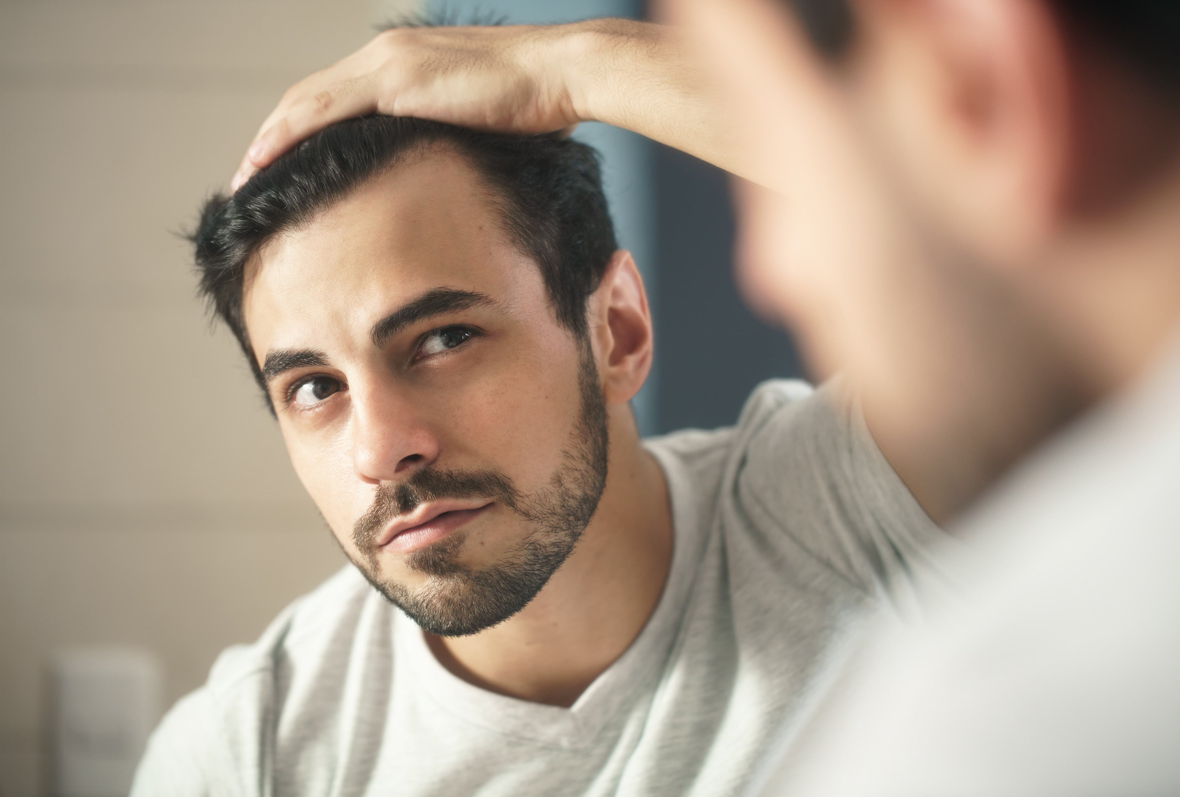Man looking for balding. 