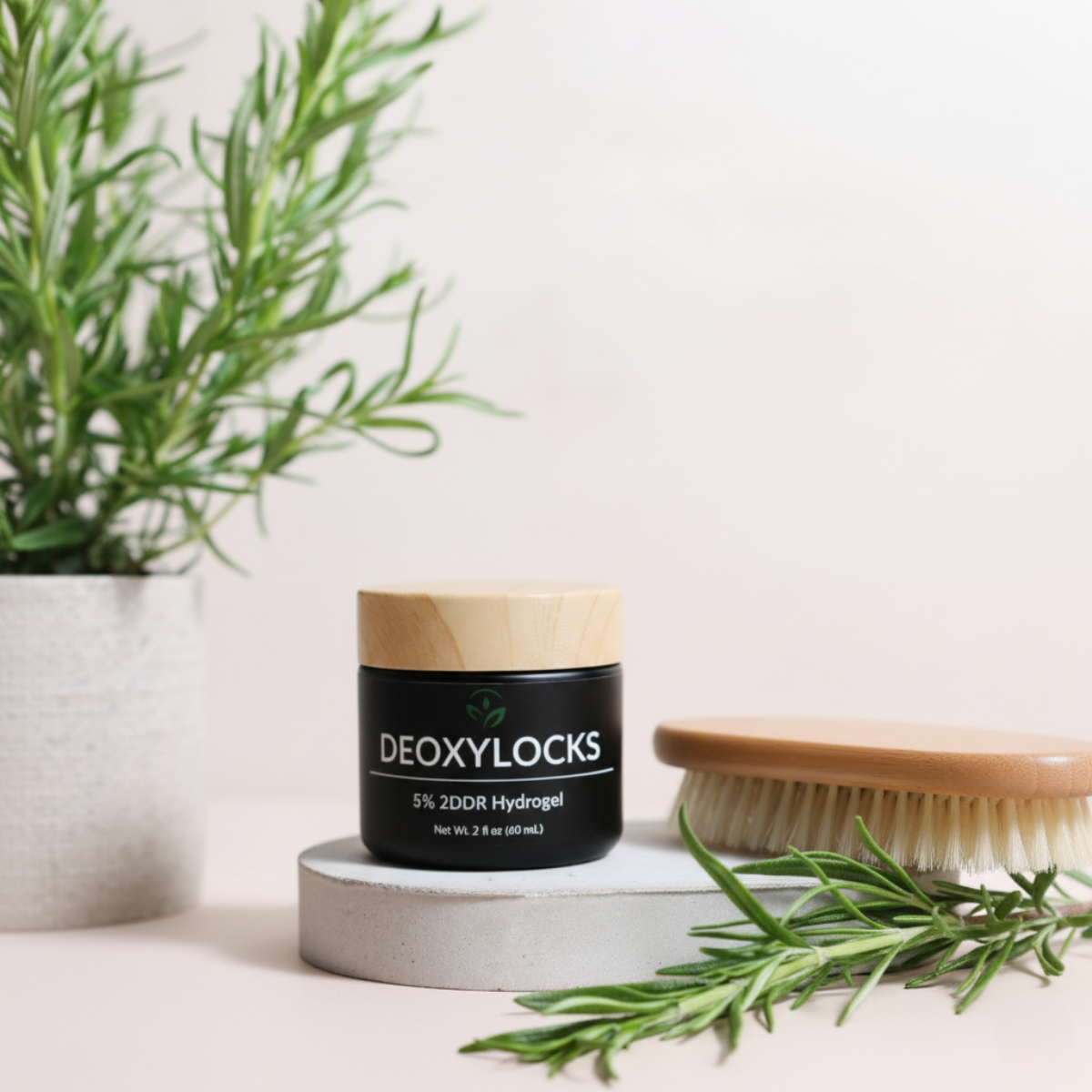Deoxylocks 5% 2DDR Hydrogel jar with natural rosemary and brush on a clean bathroom counter – premium hair regrowth treatment